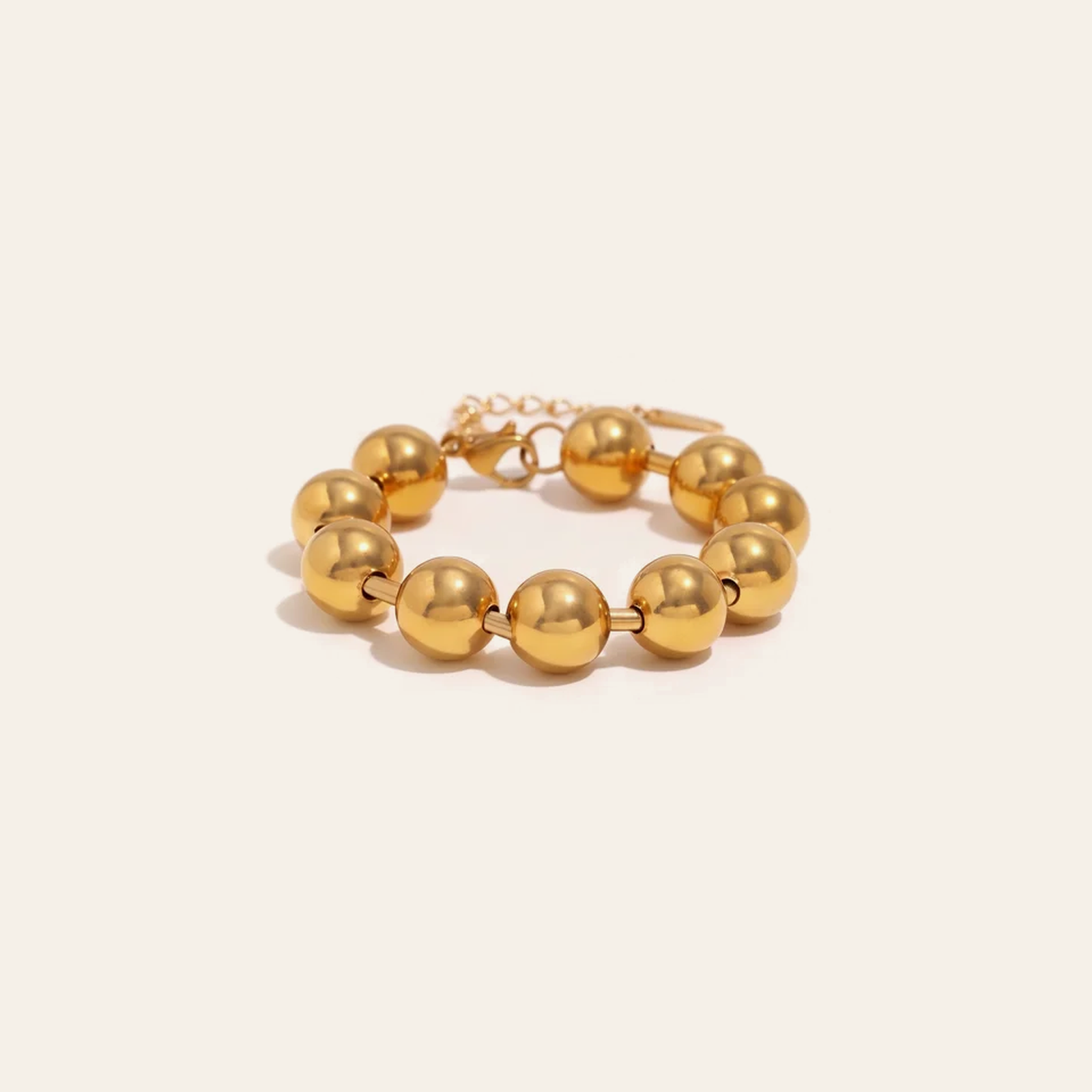 Garnet heart bracelet on gold chain