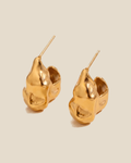 Molten sculptural gold hoop earrings